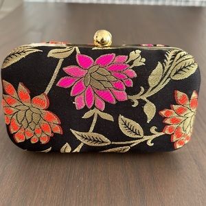 Black embroidered clutch